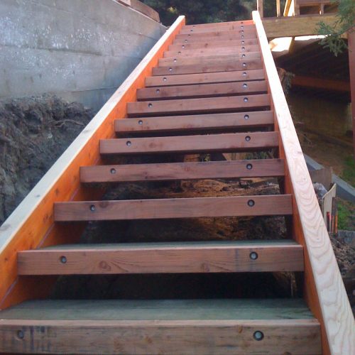 Wood frame of 15 steps in backyard